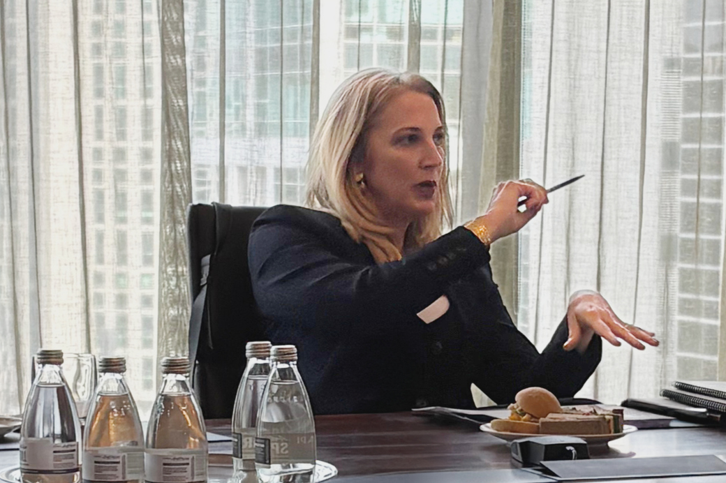 Amy Hepburn CEO – Investor Leadership Network, seated in discussion during an event at the Future Fund's Melbourne office, with audience members gathered around the speakers.